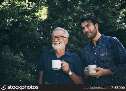 Happy Father and son with coffee cup