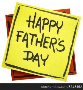 happy father&rsquo;s day - handwriting in black ink on an isolated sticky note