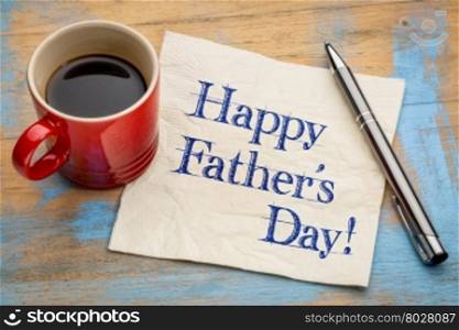 happy father&rsquo;s day - handwriting on a napkin with a cup of coffee