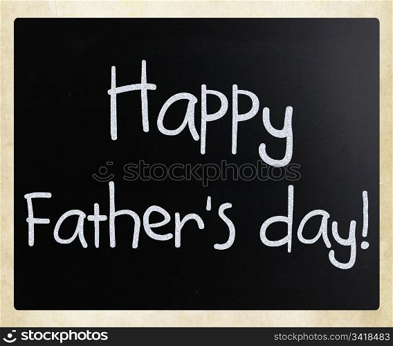 ""Happy father&rsquo;s day" handwritten with white chalk on a blackboard"