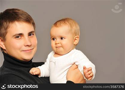 Happy father with his baby