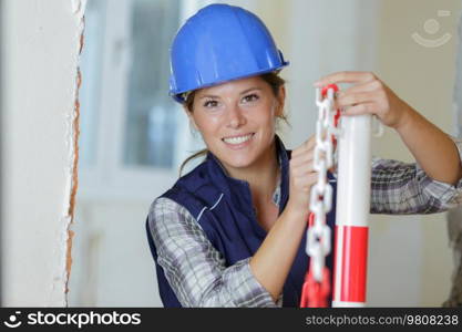 happy female builder at work