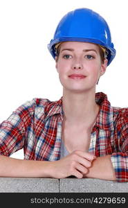 Happy female construction worker