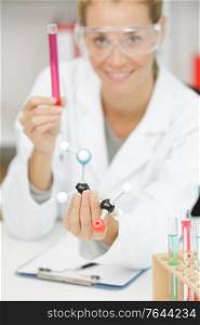 happy female scientist in lab