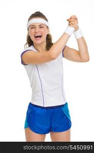 Happy female tennis player rejoicing success