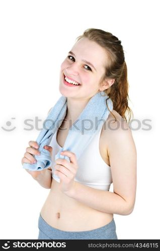 Happy fit young woman after workout holding towel