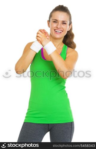 Happy fitness young woman showing approval gesture