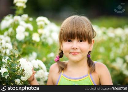 Happy five years Girl smiling outdoors headshot
