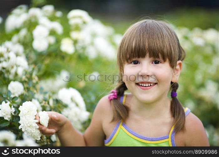 Happy five years Girl smiling outdoors headshot. Girl smiling outdoors