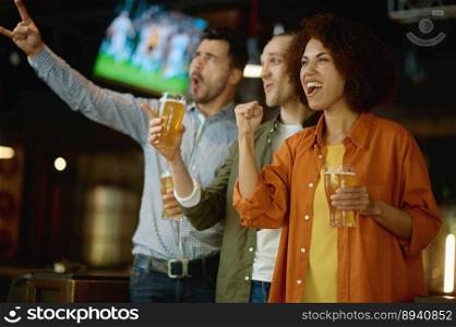 Happy football fans drinking beer and celebrating victory of favorite soccer team at sports bar or pub. Sport, young people friendship, leisure and entertainment concept. Happy football fans drinking beer and celebrating victory at sport bar