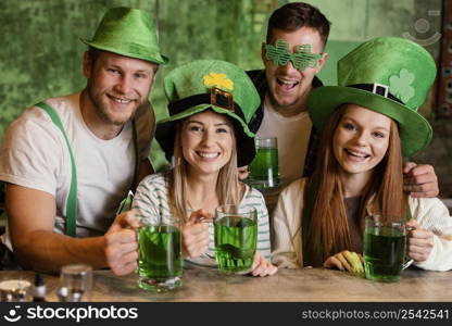 happy friends celebrating together st patrick s day bar