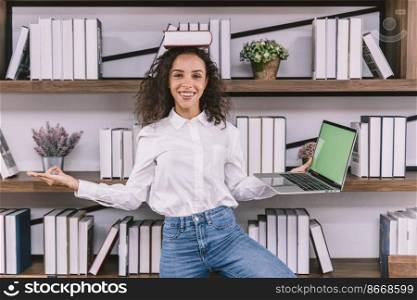 Happy fun university girl teen or business worker doing yoga in the office funny joke relax posture.