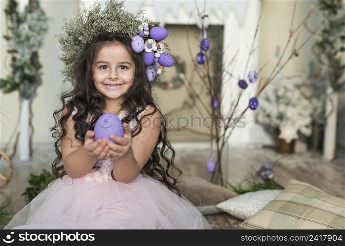 happy girl flower wreath with easter egg