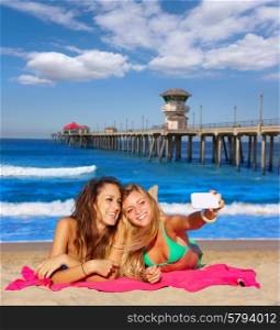 happy girl friends selfie portrait beach sand in California photo mount