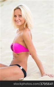 happy girl in a bikini on the beach
