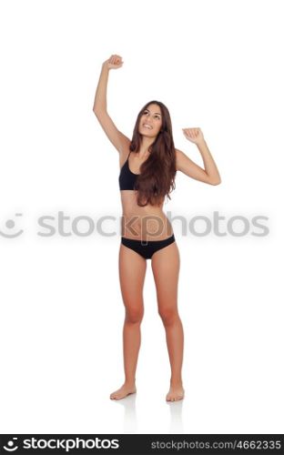 Happy girl in black underwear celebrating something isolated on a white background