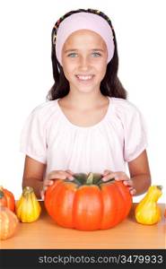 Happy girl in Halloween with a many pumpkins isolated on white background