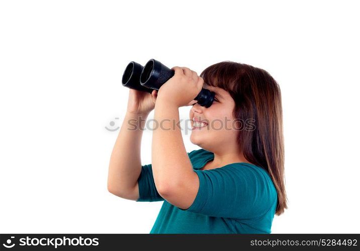 Happy girl looking through a binoculars isolated on a white background