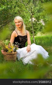 Happy girl relaxing on a meadow