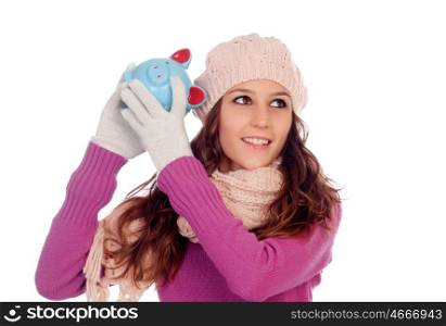 Happy girl with a money-box isolated on a white background