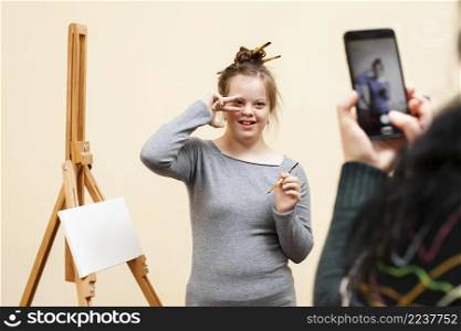 happy girl with down syndrome posing