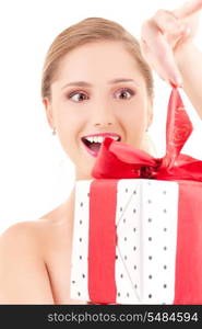 happy girl with gift box over white