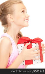 happy girl with gift box over white