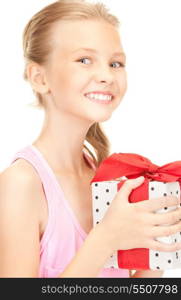 happy girl with gift box over white