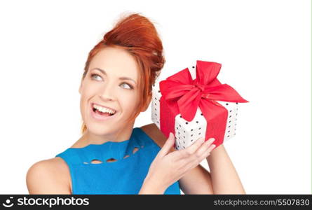 happy girl with gift box over white