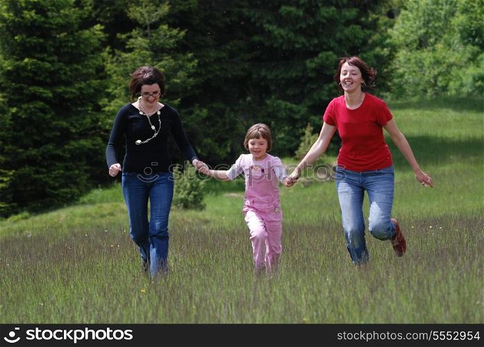 happy girls running in nature