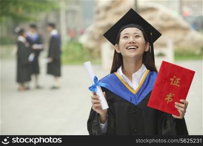 Happy Graduate with Diploma