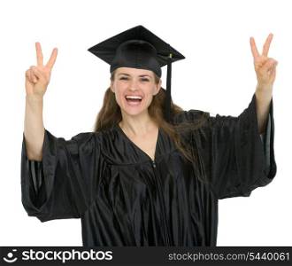 Happy graduation student showing victory gesture