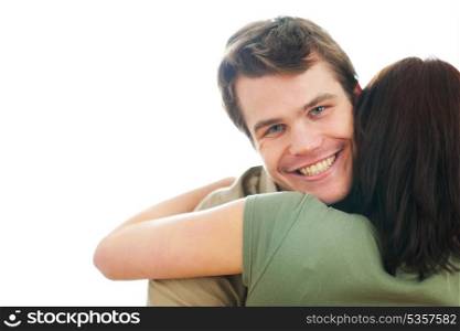Happy guy hugging girlfriend