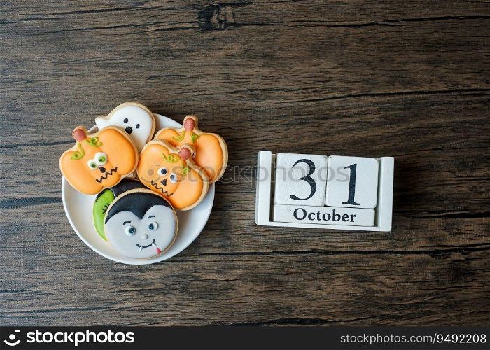 Happy Halloween day with cookies and 31 October calendar on white background. Trick or Threat, Hello October, fall autumn, Festive, party and holiday concept