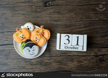 Happy Halloween day with cookies and 31 October calendar on white background. Trick or Threat, Hello October, fall autumn, Festive, party and holiday concept