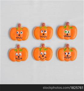Happy Halloween day with funny Cookies, different Pumpkin biscuits on table background. Trick or Threat, Hello October, fall autumn, Traditional, party and holiday concept