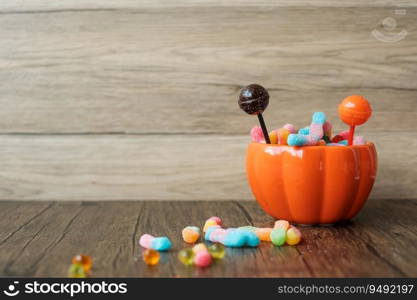 Happy Halloween day with ghost candies, pumpkin bowl, Jack O lantern and decorative  selective focus . Trick or Threat, Hello October, fall autumn, Festive, party and holiday concept