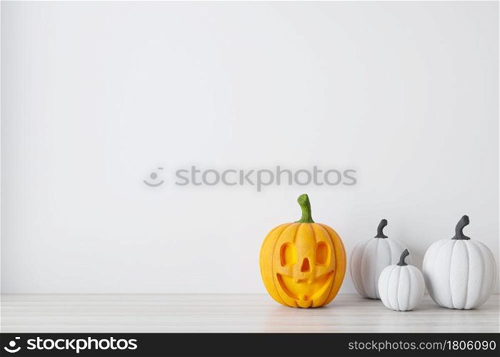 Happy halloween holiday concept. Halloween background with Jack O&rsquo;Lantern and pumpkins