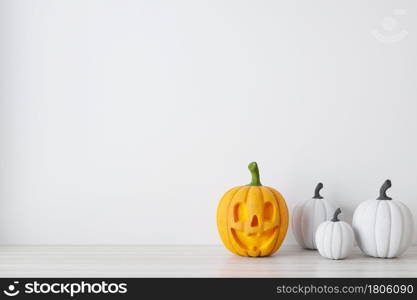 Happy halloween holiday concept. Halloween background with Jack O&rsquo;Lantern and pumpkins