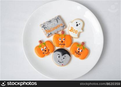 Happy Halloween with funny Cookies  Pumpkin, scary ghost, spooky mummy, bat, frankenstein, dracula and spider. Trick or Threat, Hello October, fall autumn, Traditional, party and holiday concept