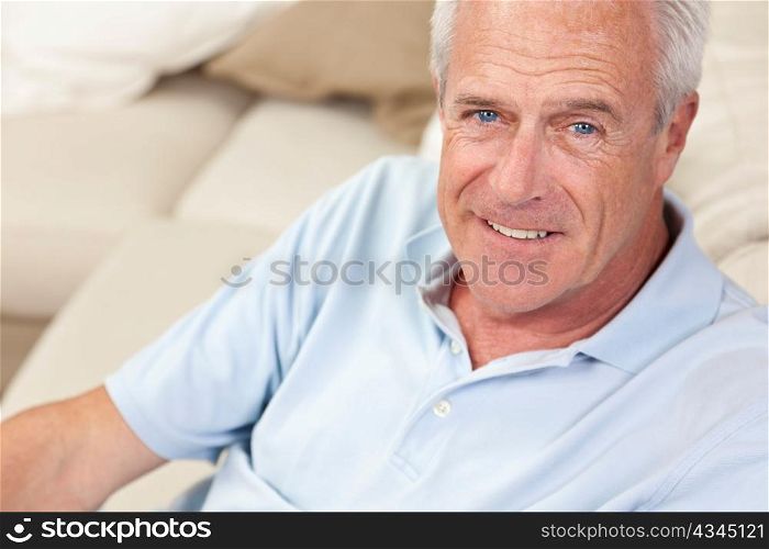 Happy Handsome Senior Man Smiling at Home