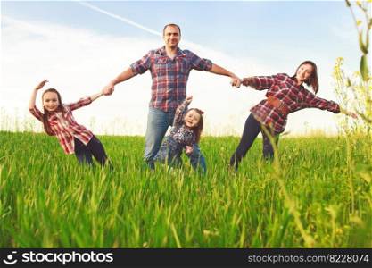 happy happy family all together on nature. happy family all together on nature