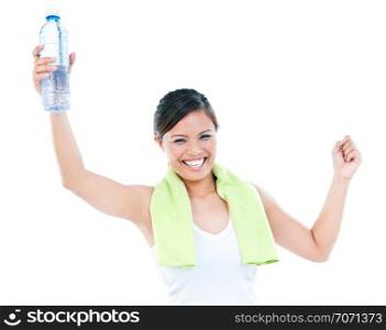 Happy healthy fitness woman holding a bottle of water over white background