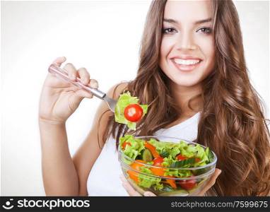 happy healthy woman with salad on fork