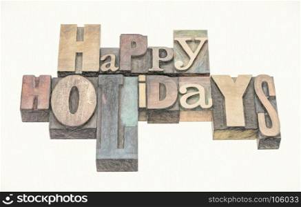 Happy Holidays greeting card in mixed letterpress wood type printing blocks, digital painting effect applied to a photograph