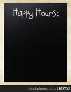 ""Happy Hours" handwritten with white chalk on a blackboard"