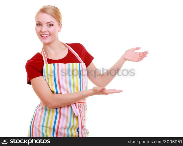 Happy housewife kitchen apron or small business owner entrepreneur shop assistant waitress making inviting welcome gesture pointing copy space isolated on white