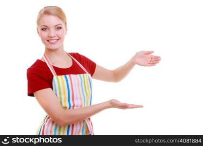 Happy housewife kitchen apron or small business owner entrepreneur shop assistant waitress making inviting welcome gesture pointing copy space isolated on white