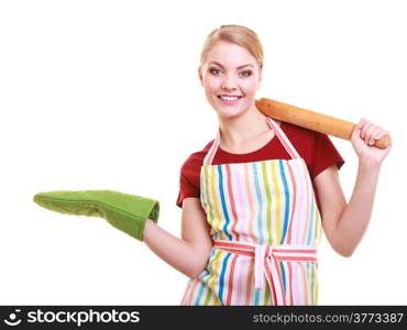 Happy housewife or baker chef wearing kitchen apron green oven mitten holds baking rolling pin showing empty copy space presenting with open hand palm isolated on white