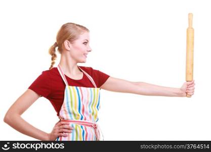 Happy housewife or baker chef wearing kitchen apron holds baking rolling pin making frame copy space for text recipe studio picture isolated on white